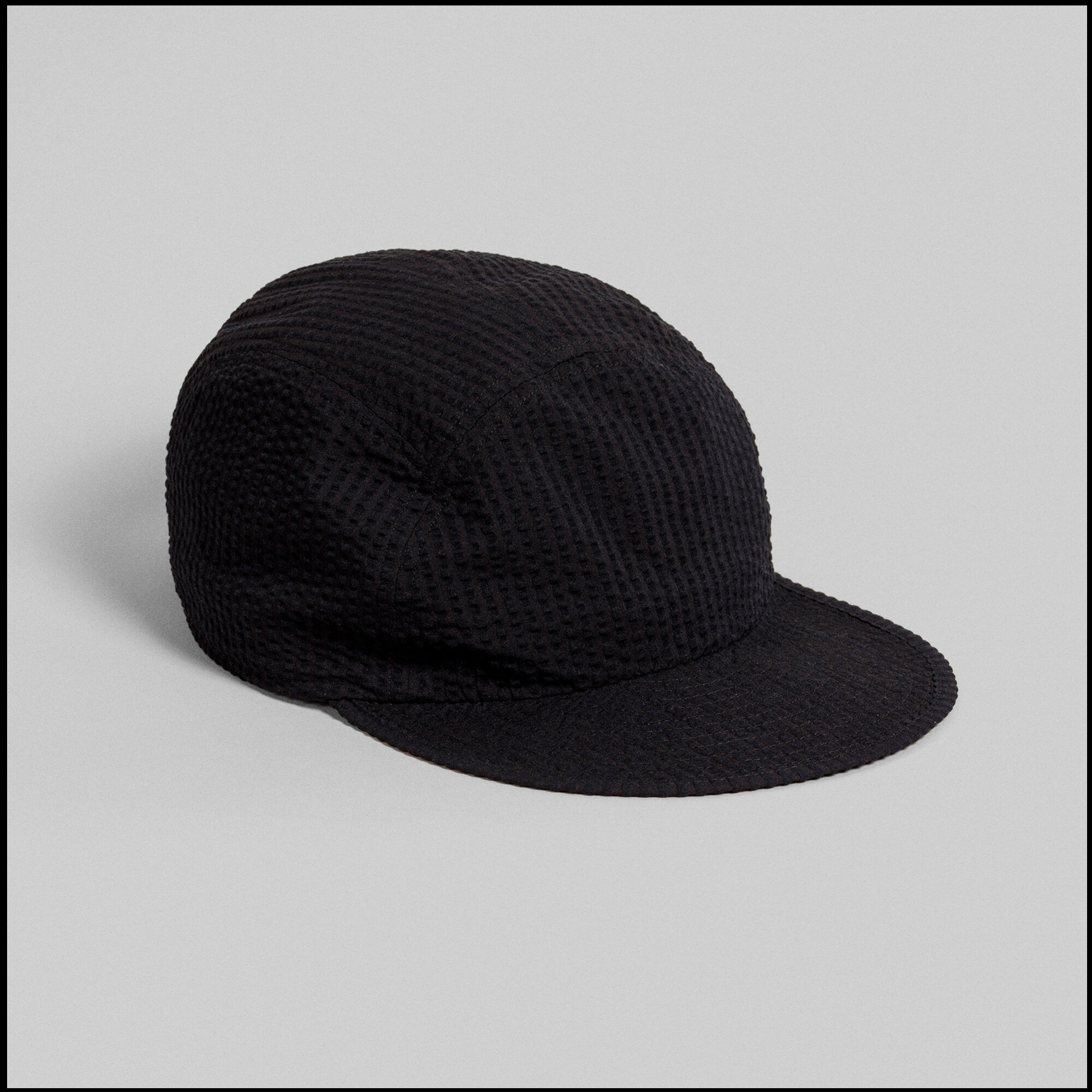 MARINA cap by Arpenteur in Black seersucker color