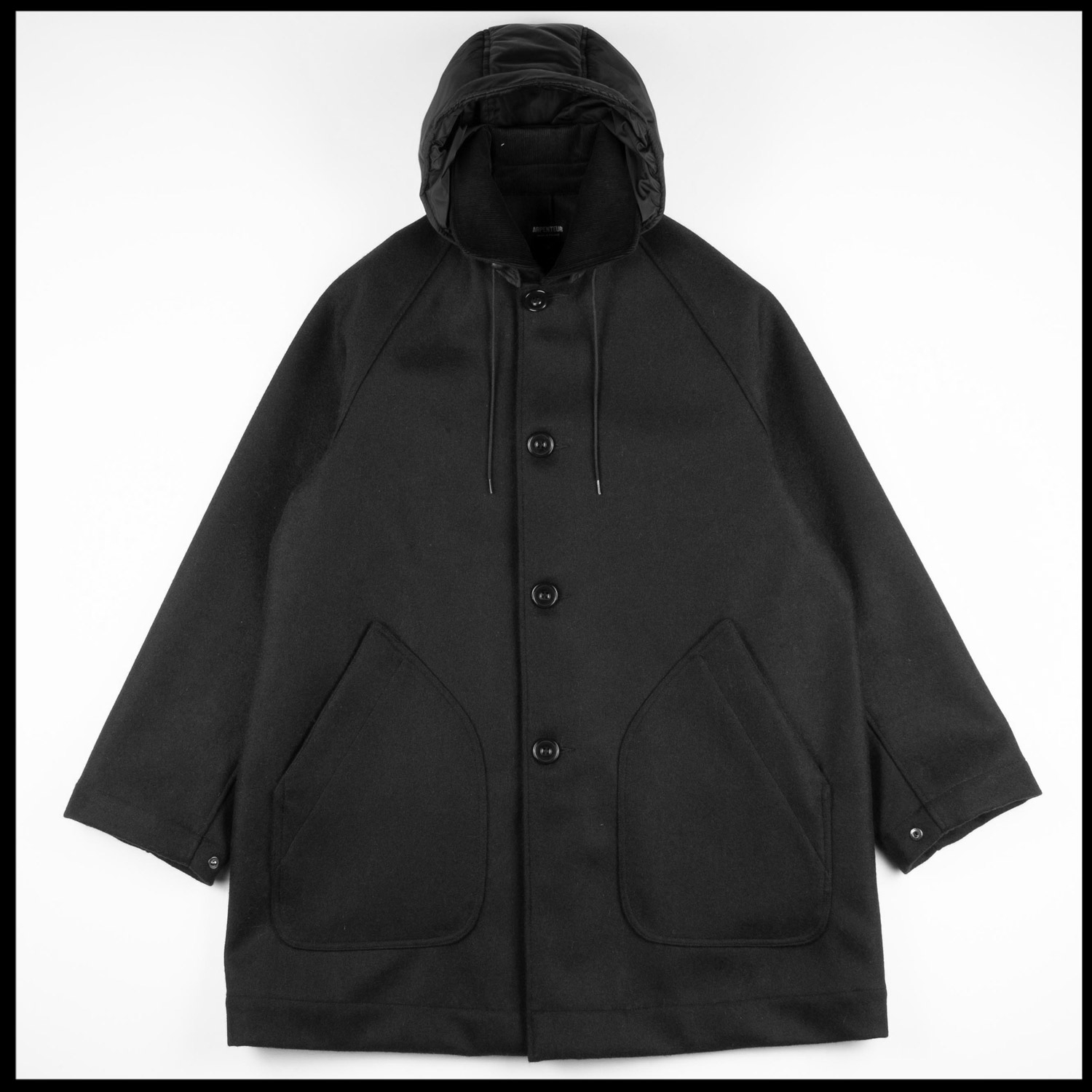 MEVI coat in Black color by Arpenteur