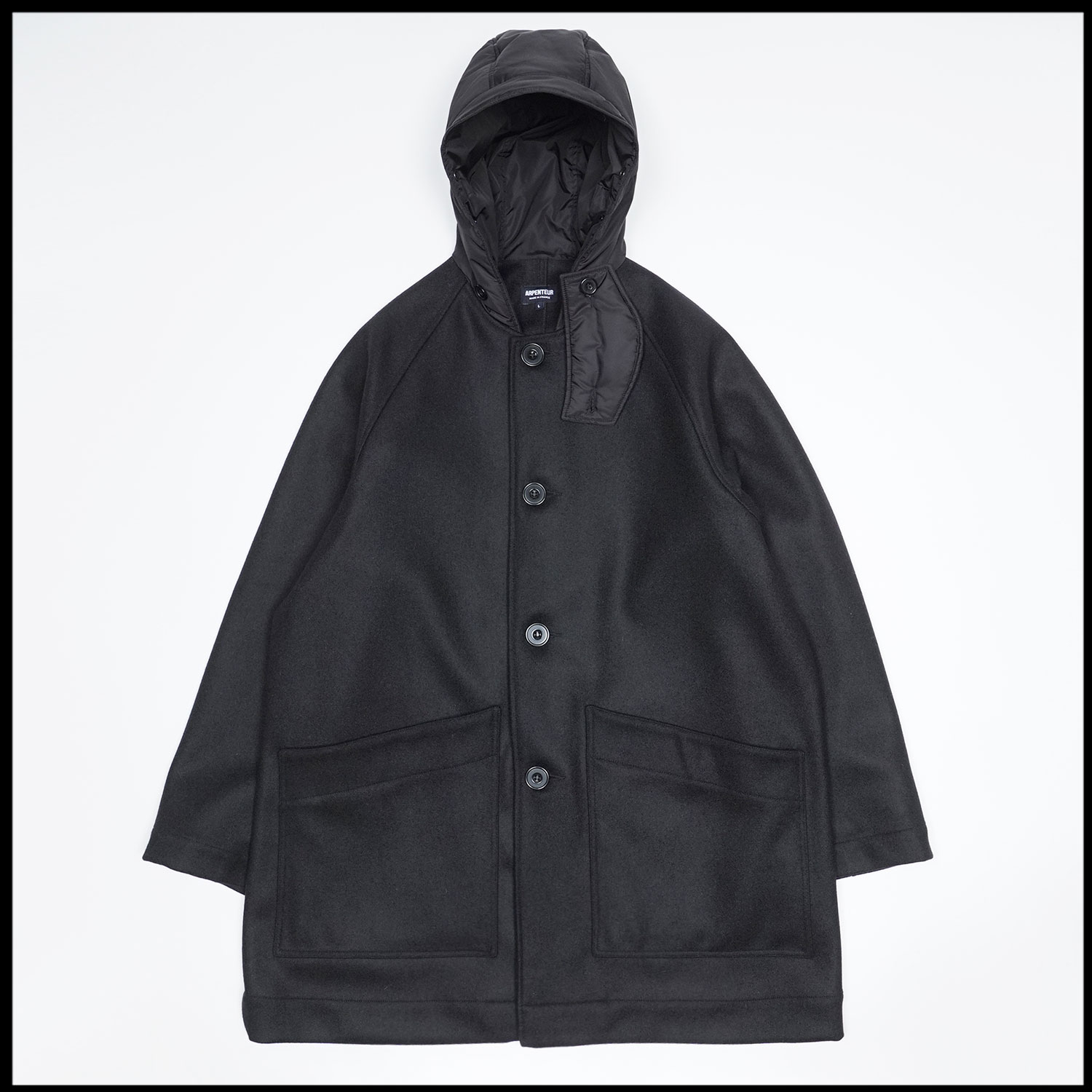 MEVI coat in Black color by Arpenteur